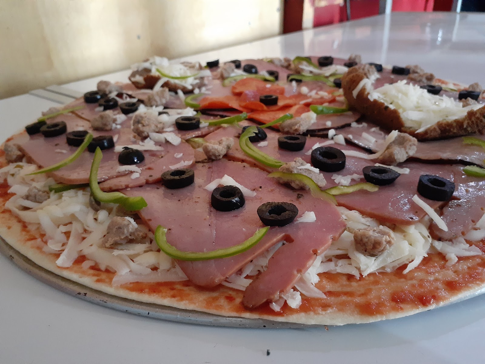 John's Delicious Pizza